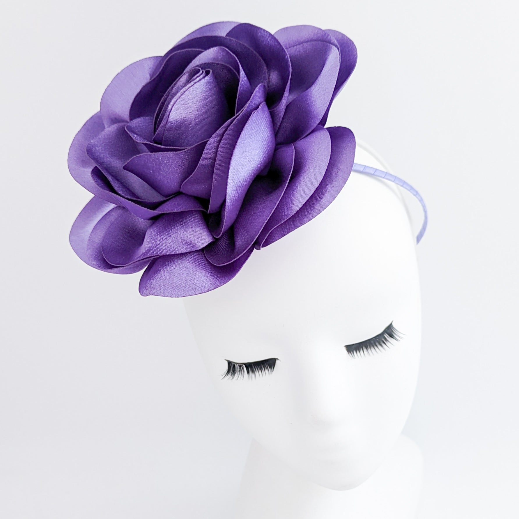 Large violet purple satin rose fascinator hat