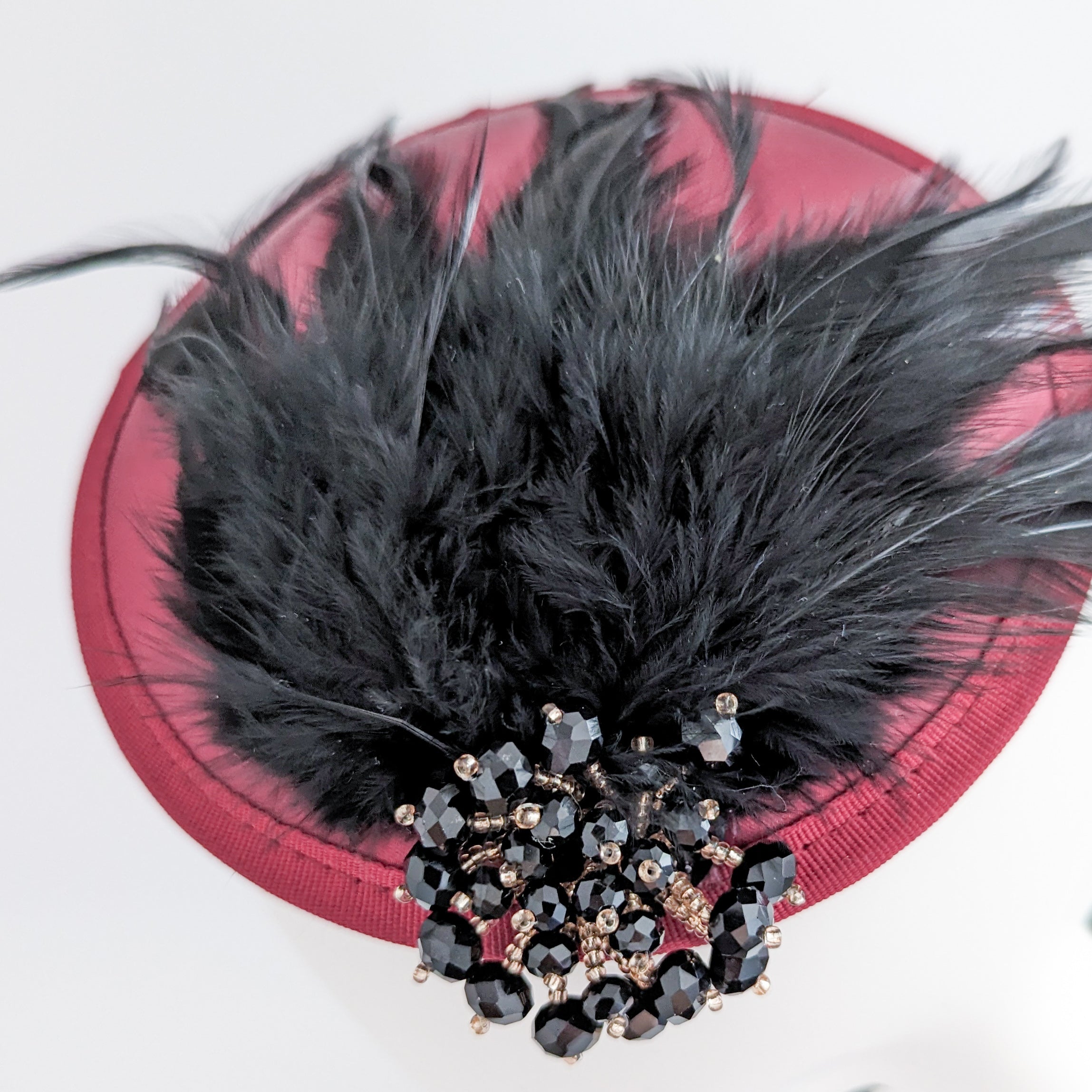 Burgundy red black crystal feather small satin fascinator hat