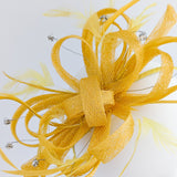 Cappello fascinator di piume di cristallo giallo senape