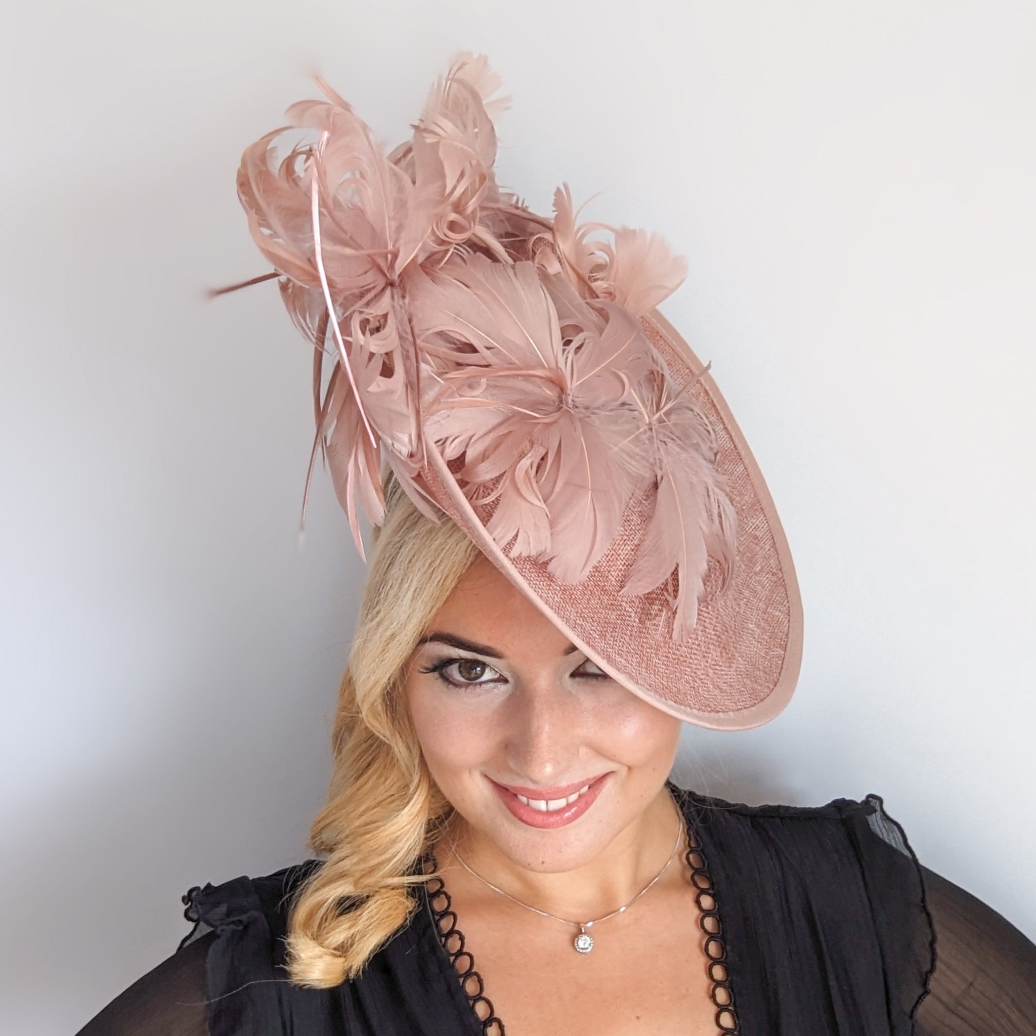 Blush pink large feather saucer disc fascinator hat