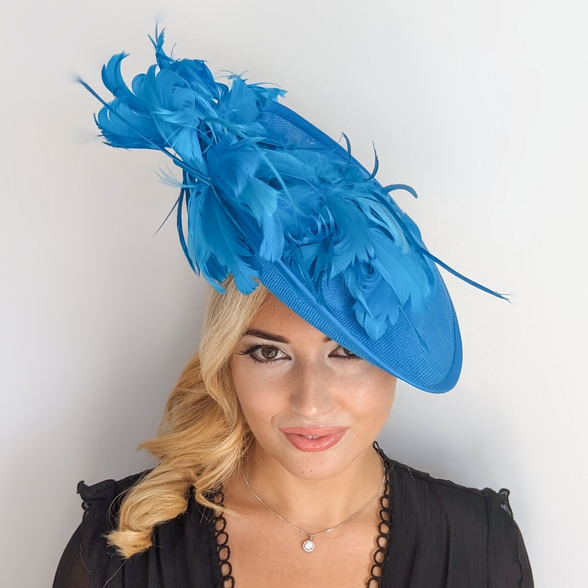 Sea blue large feather saucer disc fascinator hat