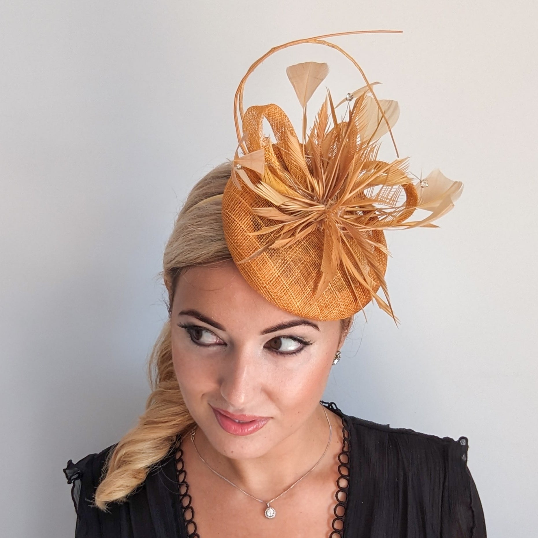 Golden yellow crystal feather fascinator hat