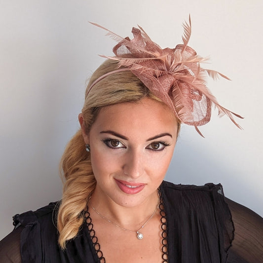 Dusty rose pink feather fascinator hat