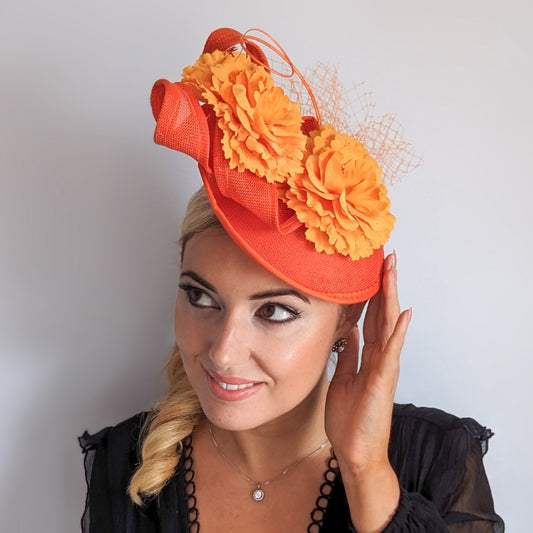 Orange flower fascinator disc saucer hat