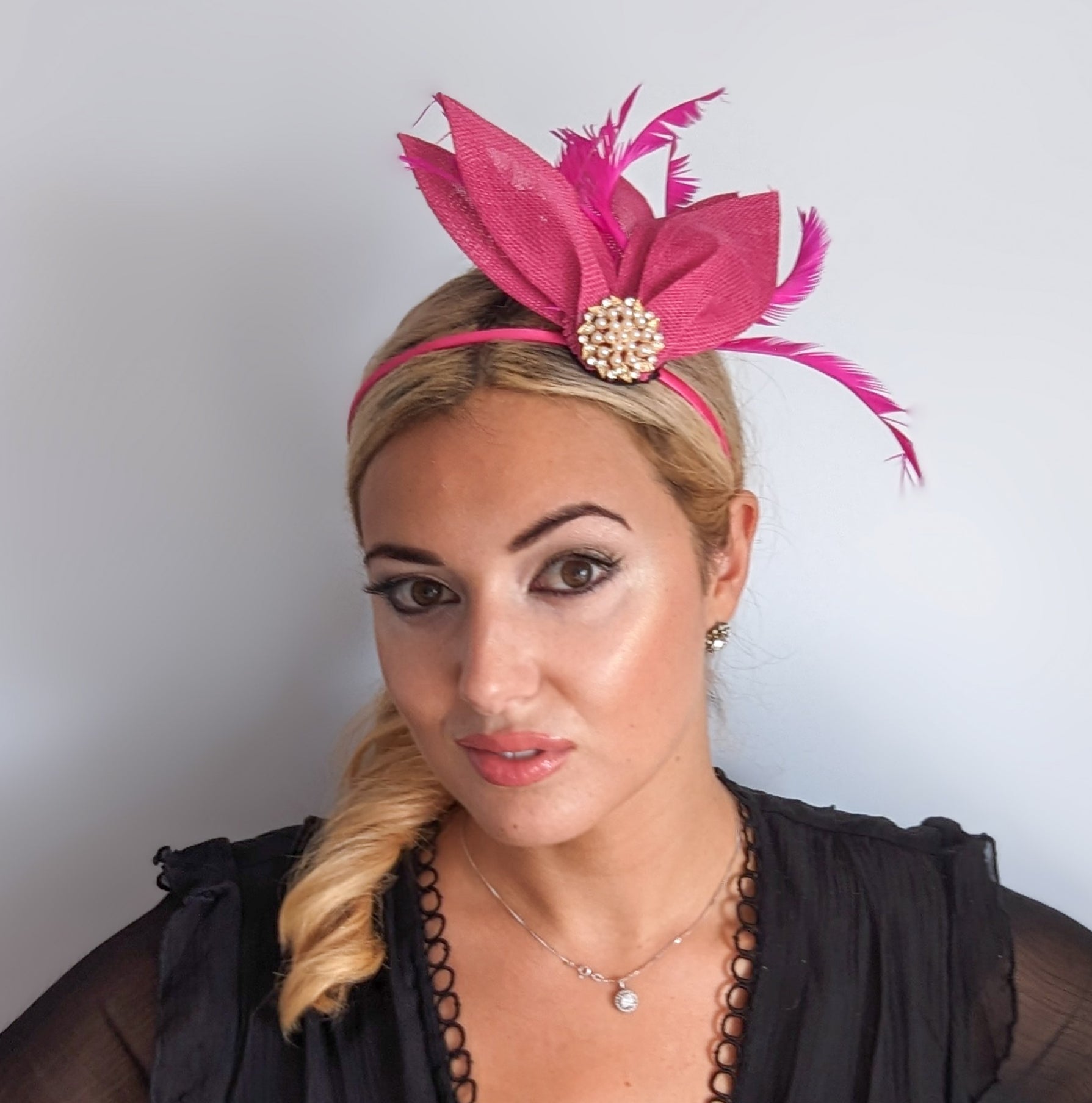 Fuchsia pink feather petal fan fascinator hat