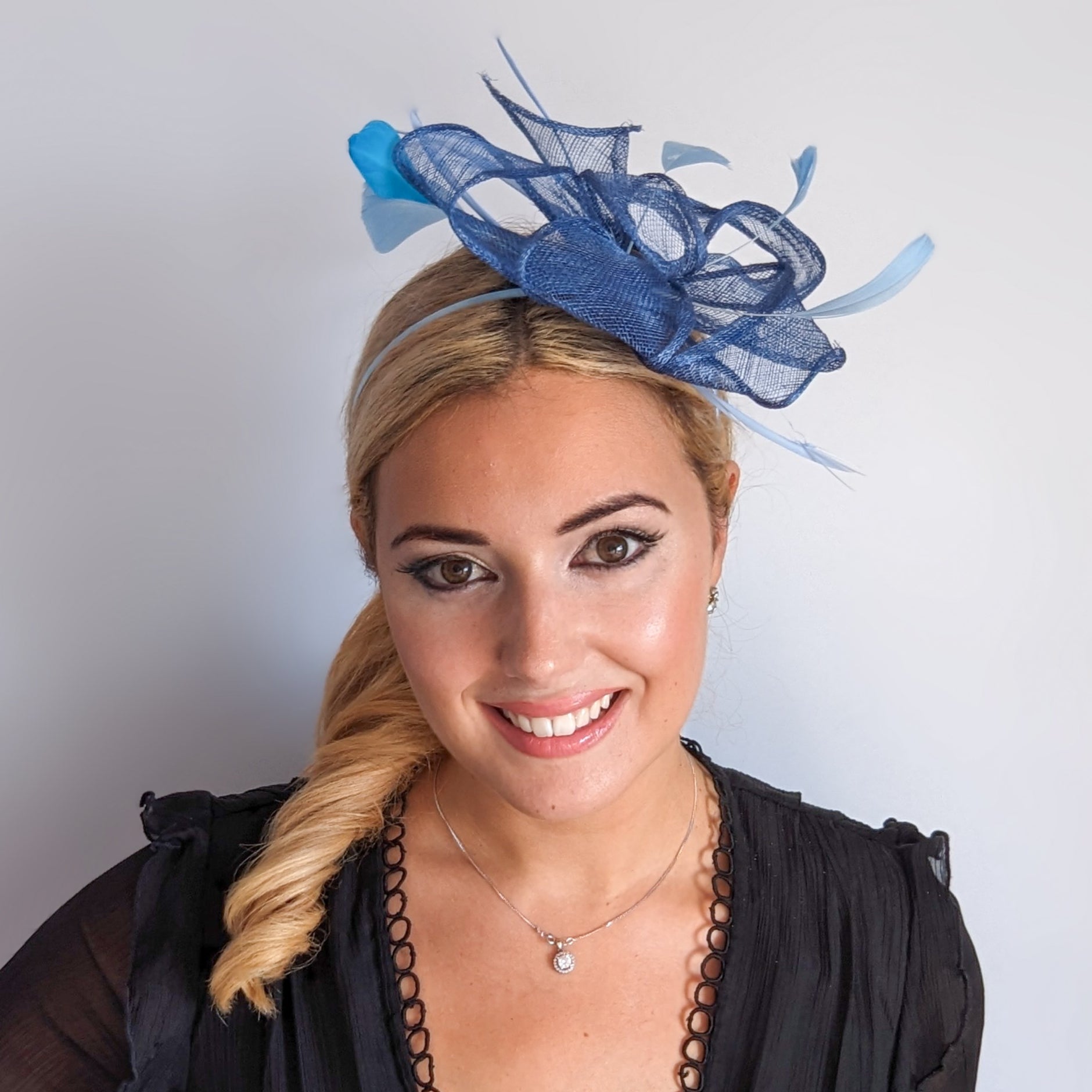 Cornflower blue feather fascinator hat