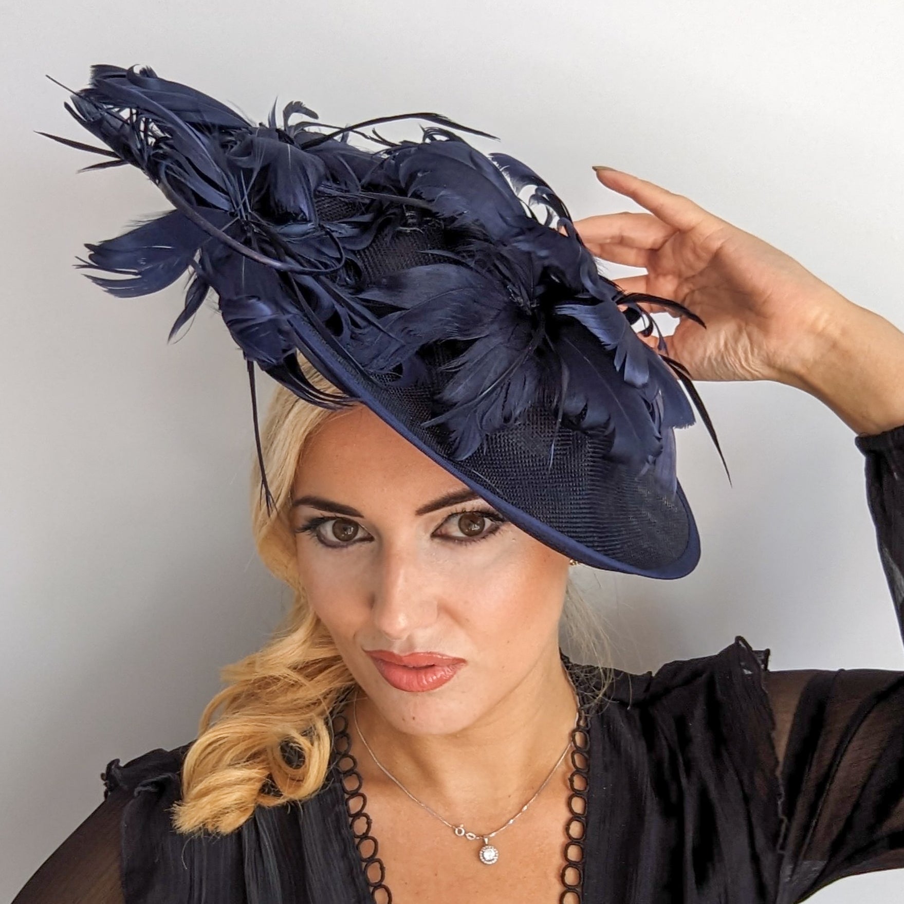 Navy blue large feather saucer disc fascinator hat