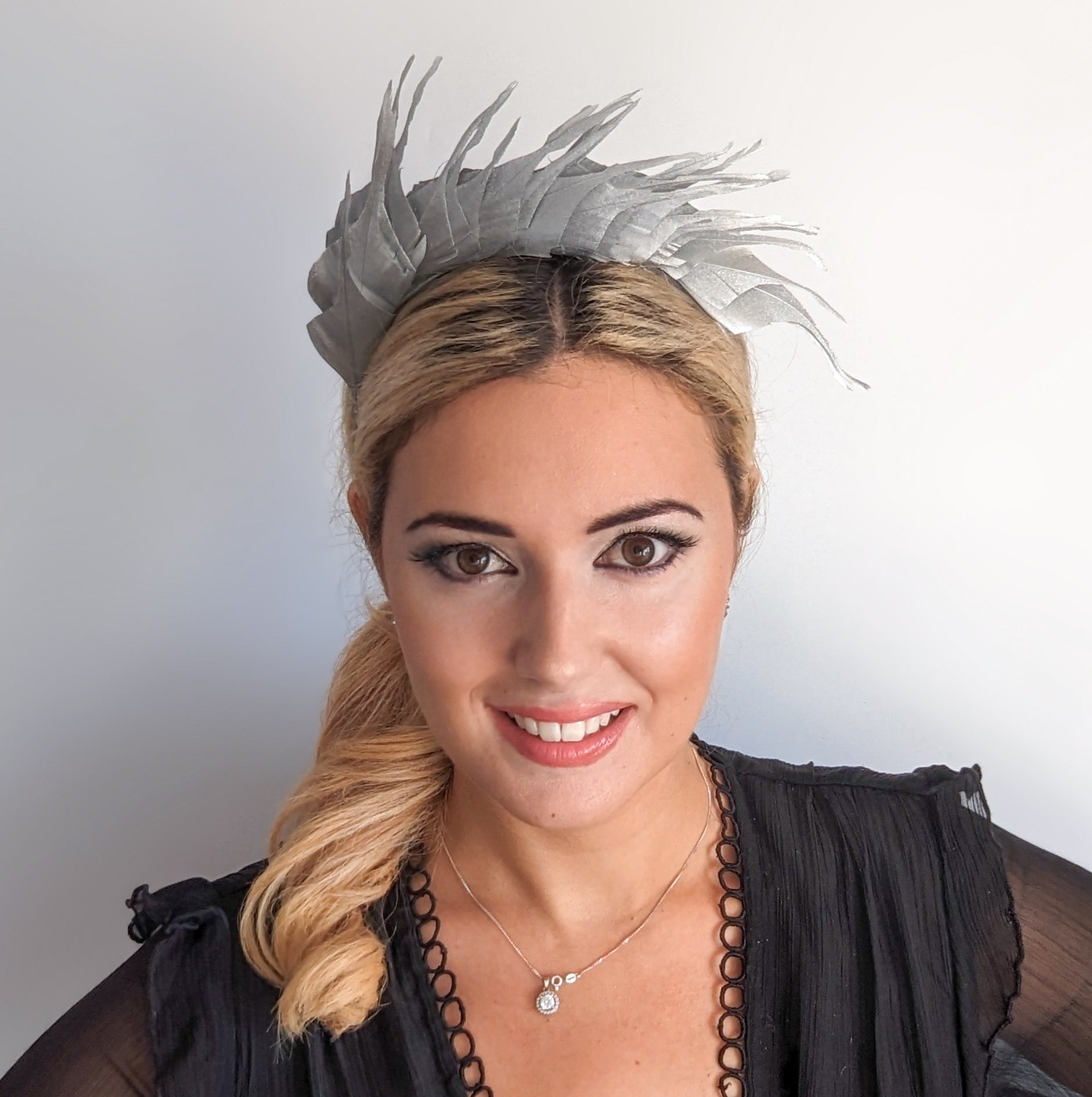 Silver metallic shimmer feather headband fascinator