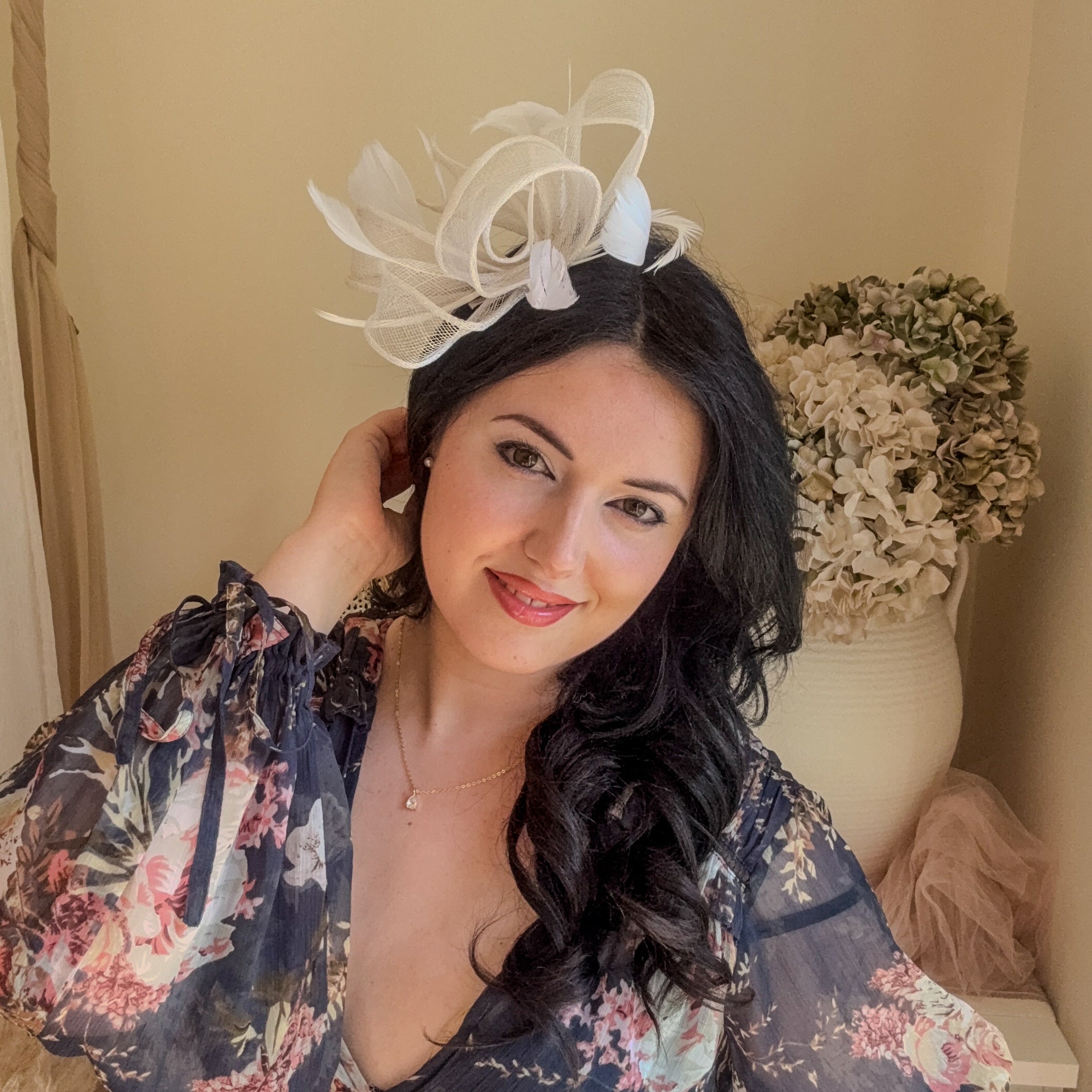 White feather fascinator hat