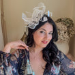 White feather fascinator hat