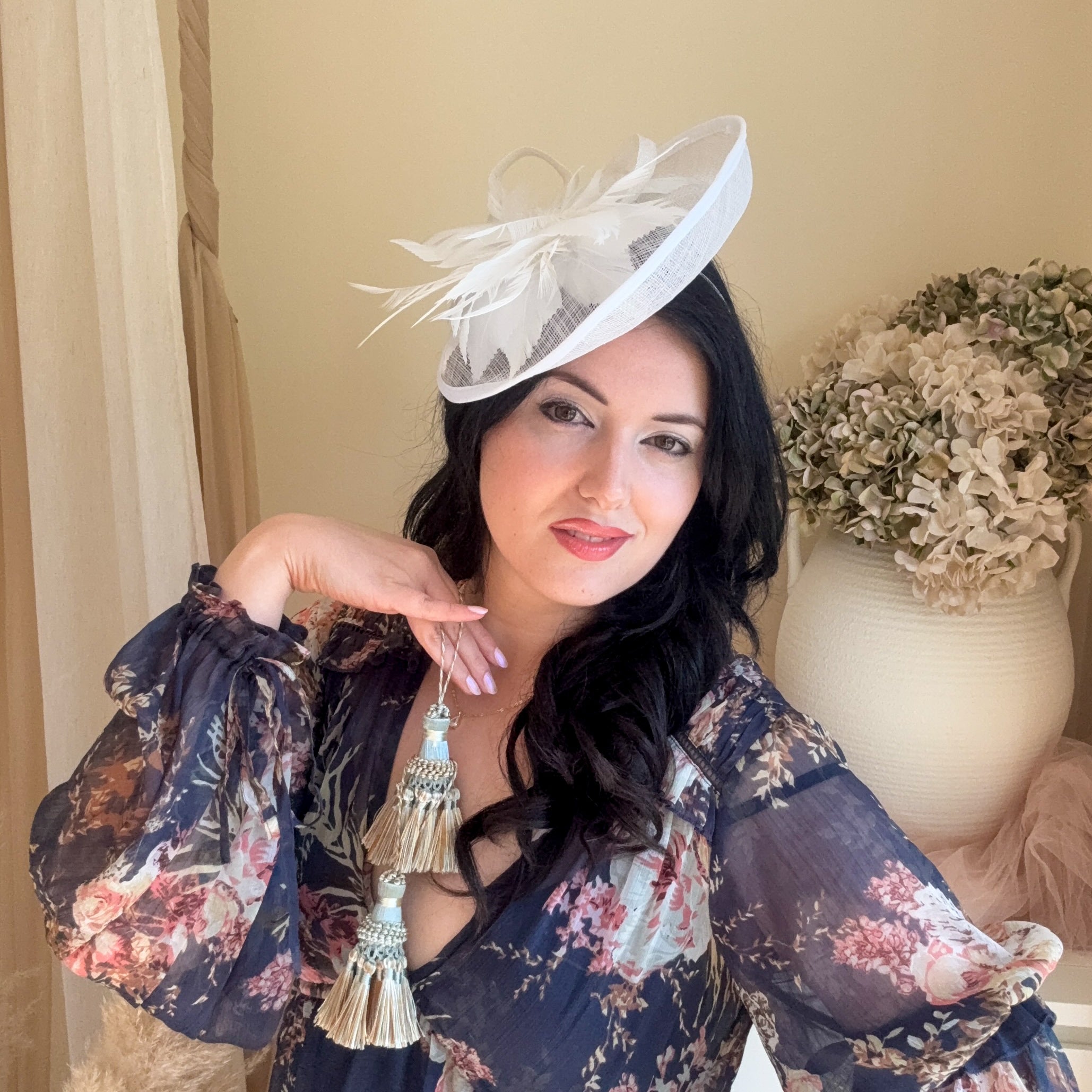White feather disc saucer fascinator hat