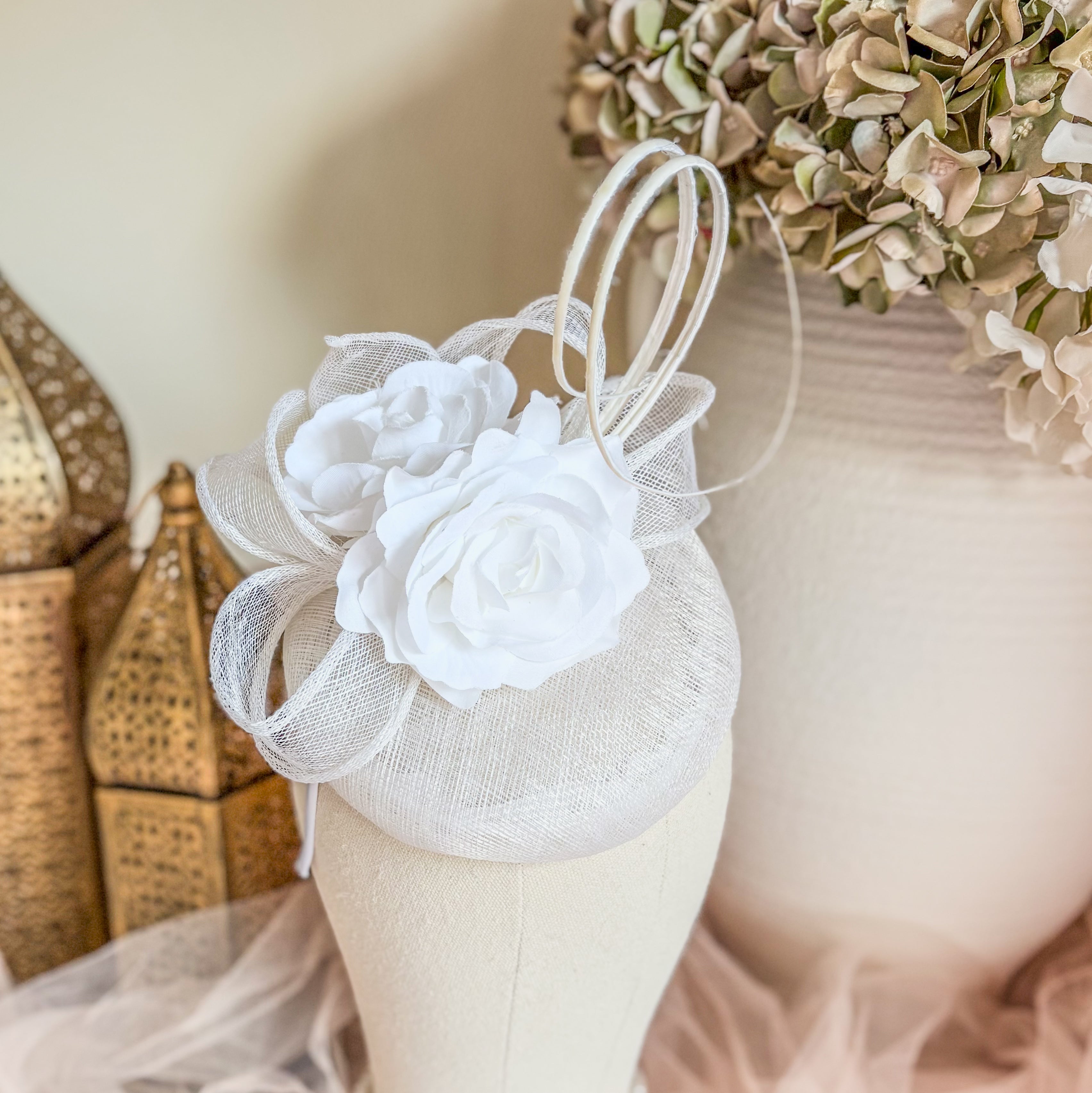 White flower fascinator hat