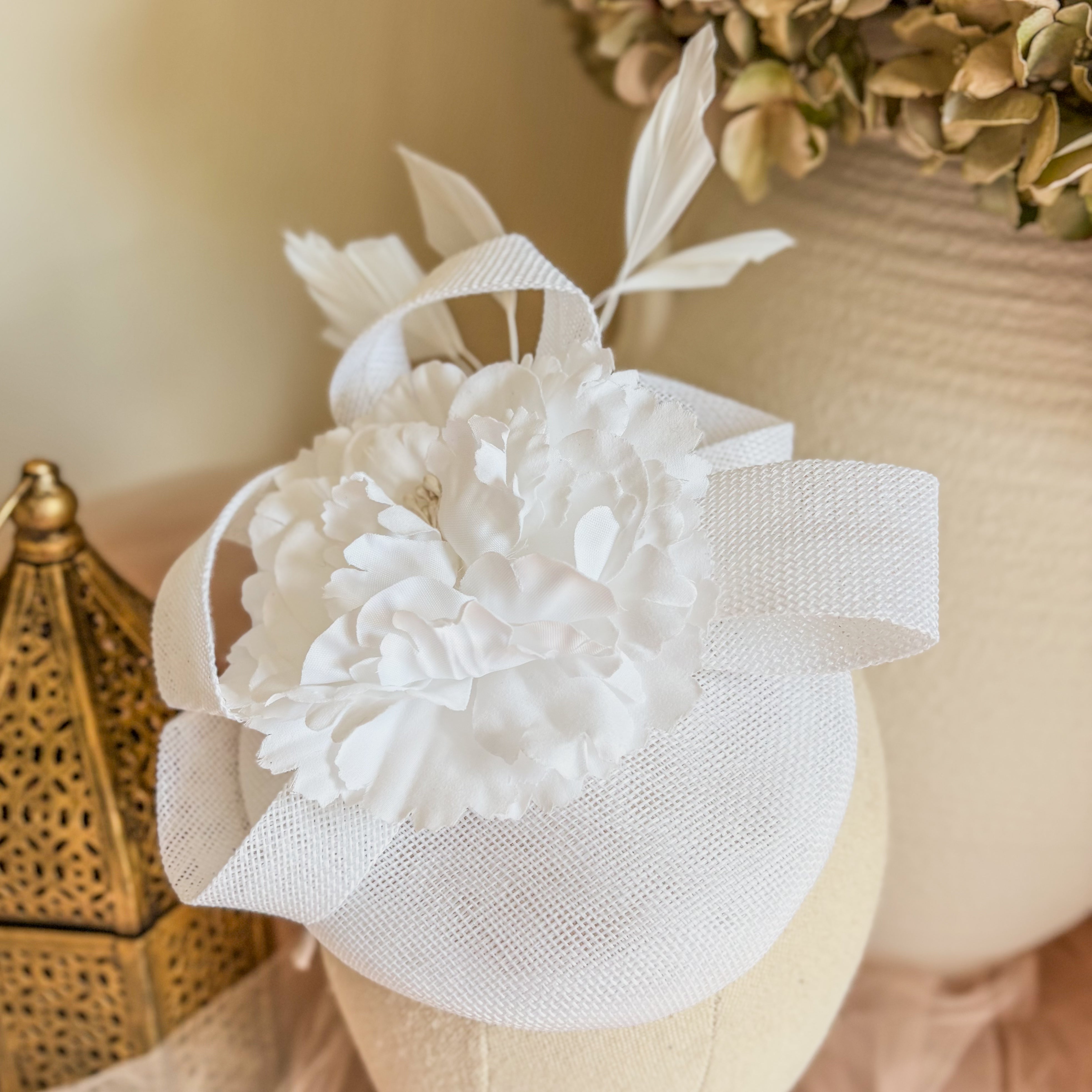 White feather flower fascinator hat