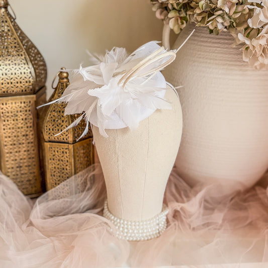 White feather fascinator hat