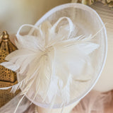 White feather disc saucer fascinator hat