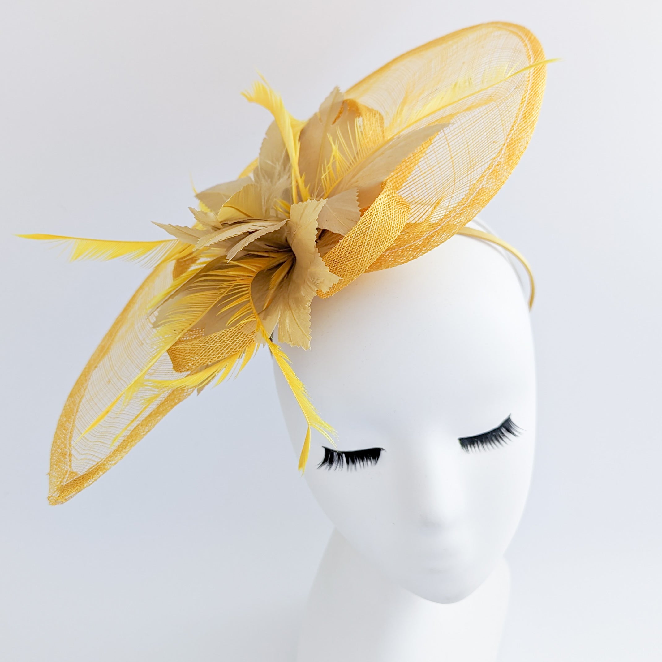 Golden yellow feather large teardrop fascinator hat