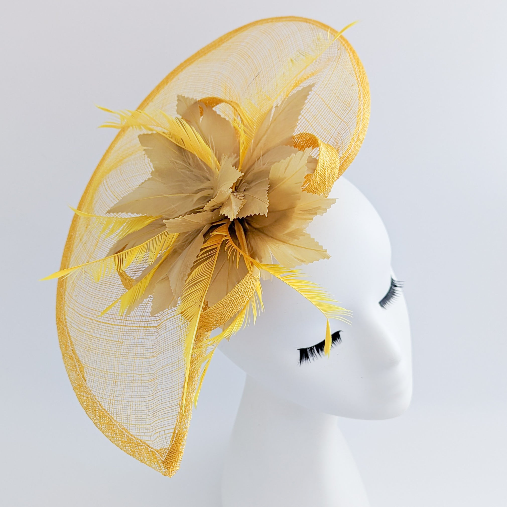 Golden yellow feather large teardrop fascinator hat