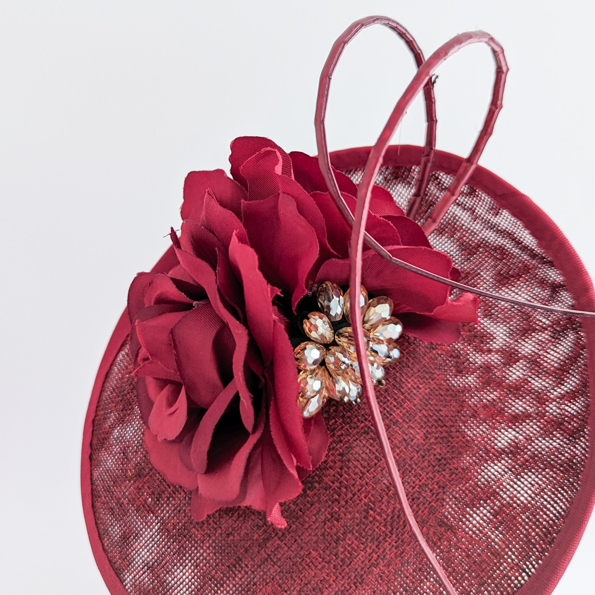 Burgundy flower disc saucer fascinator hat