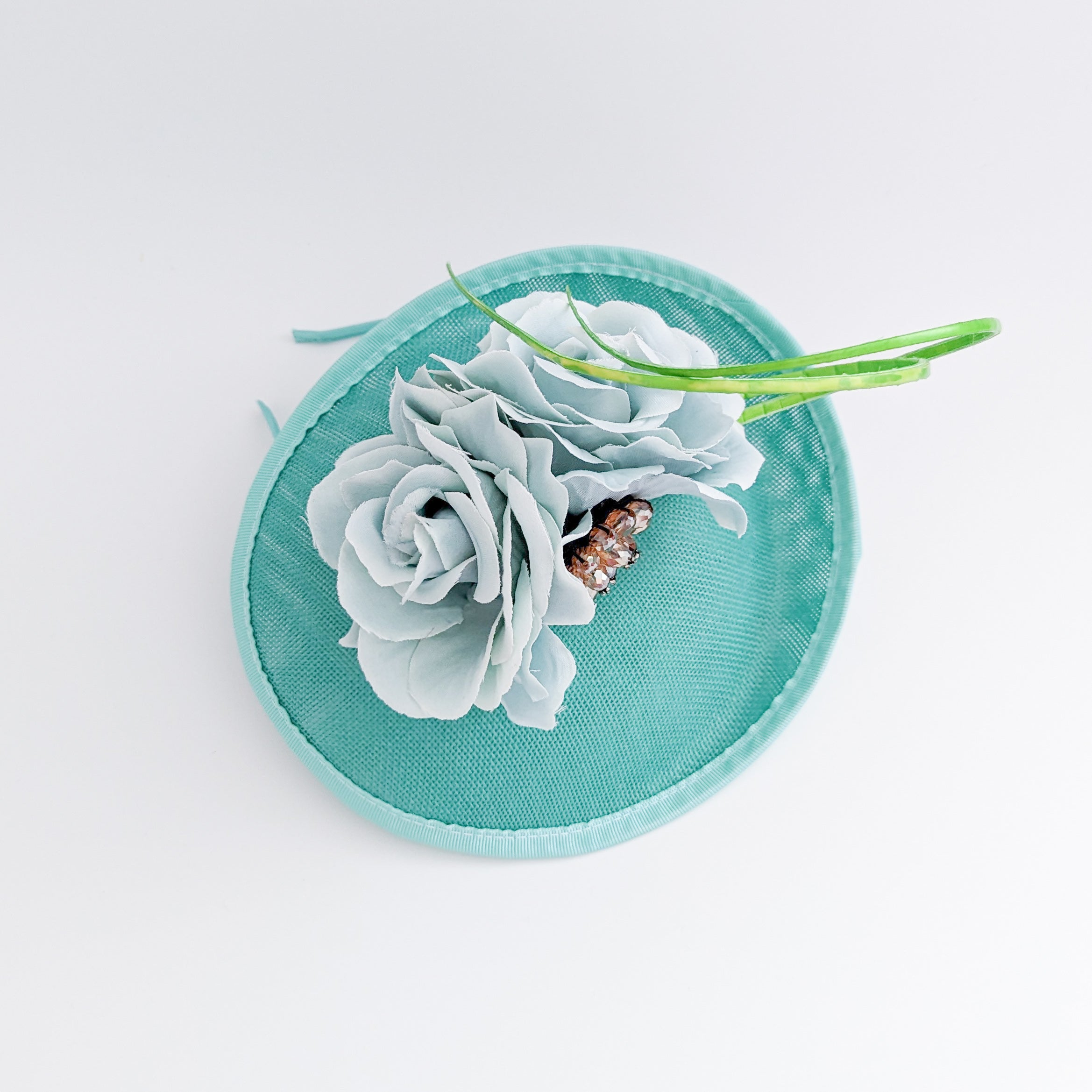 Seafoam mint green flower disc saucer fascinator hat