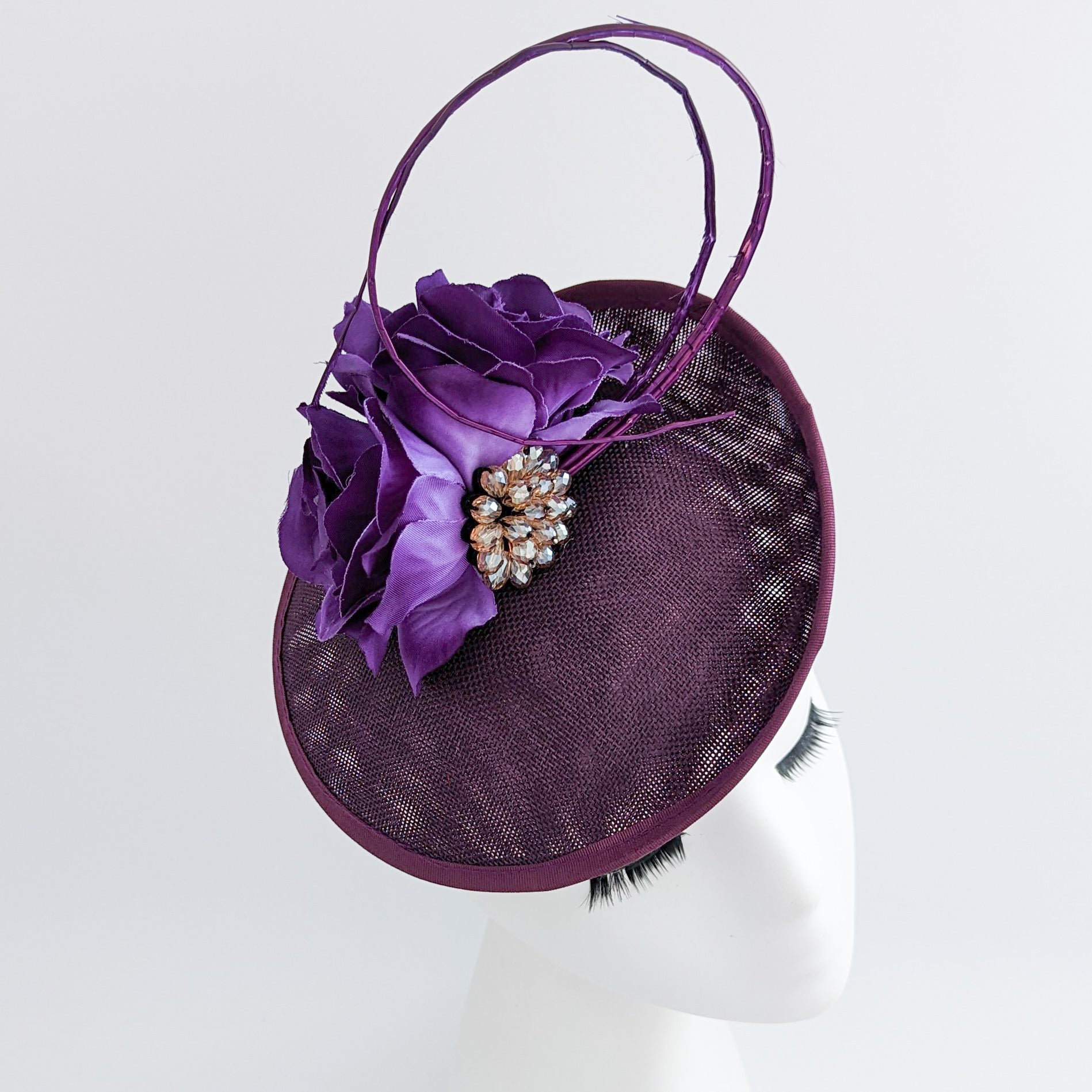 Dark plum purple flower disc saucer fascinator hat