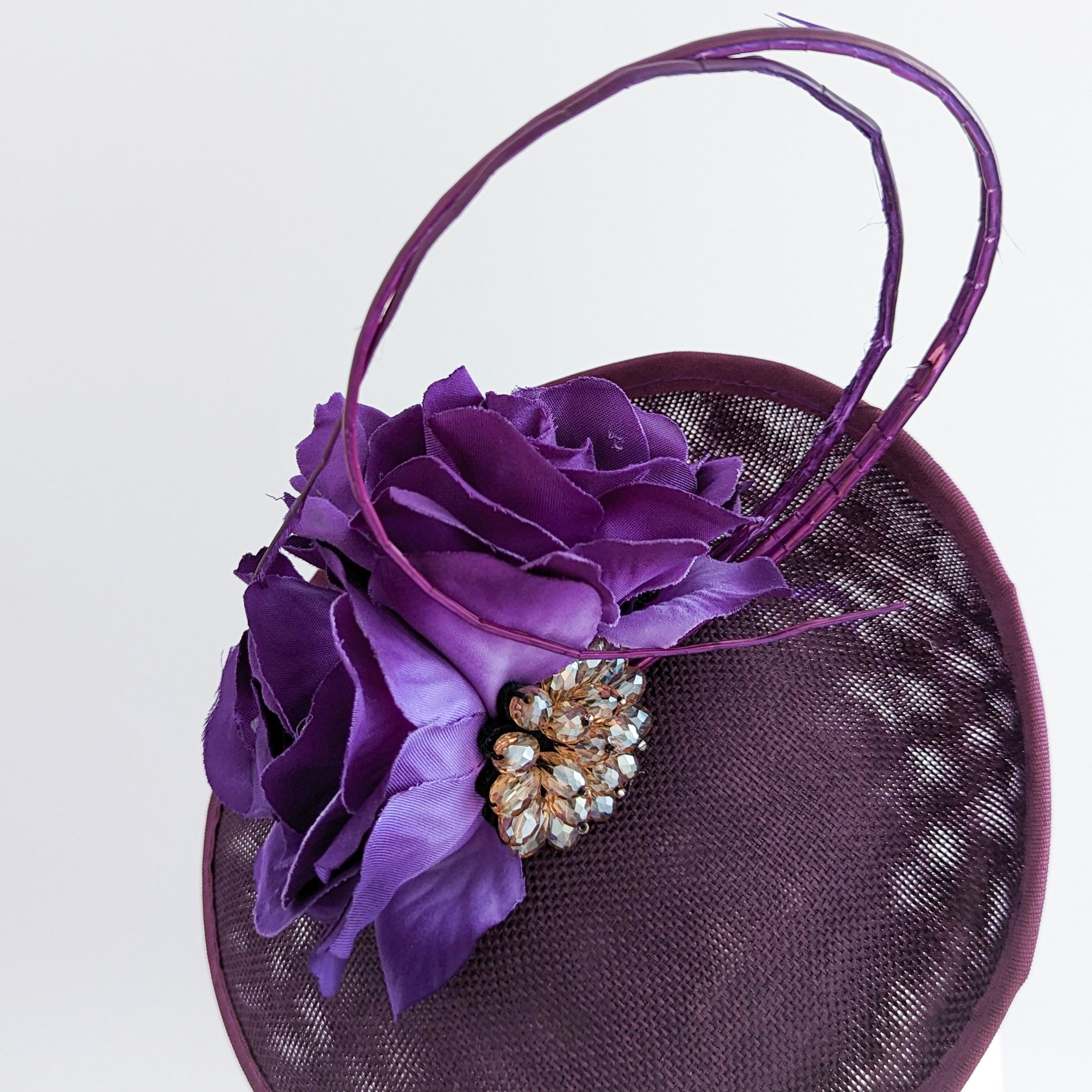 Dark plum purple flower disc saucer fascinator hat