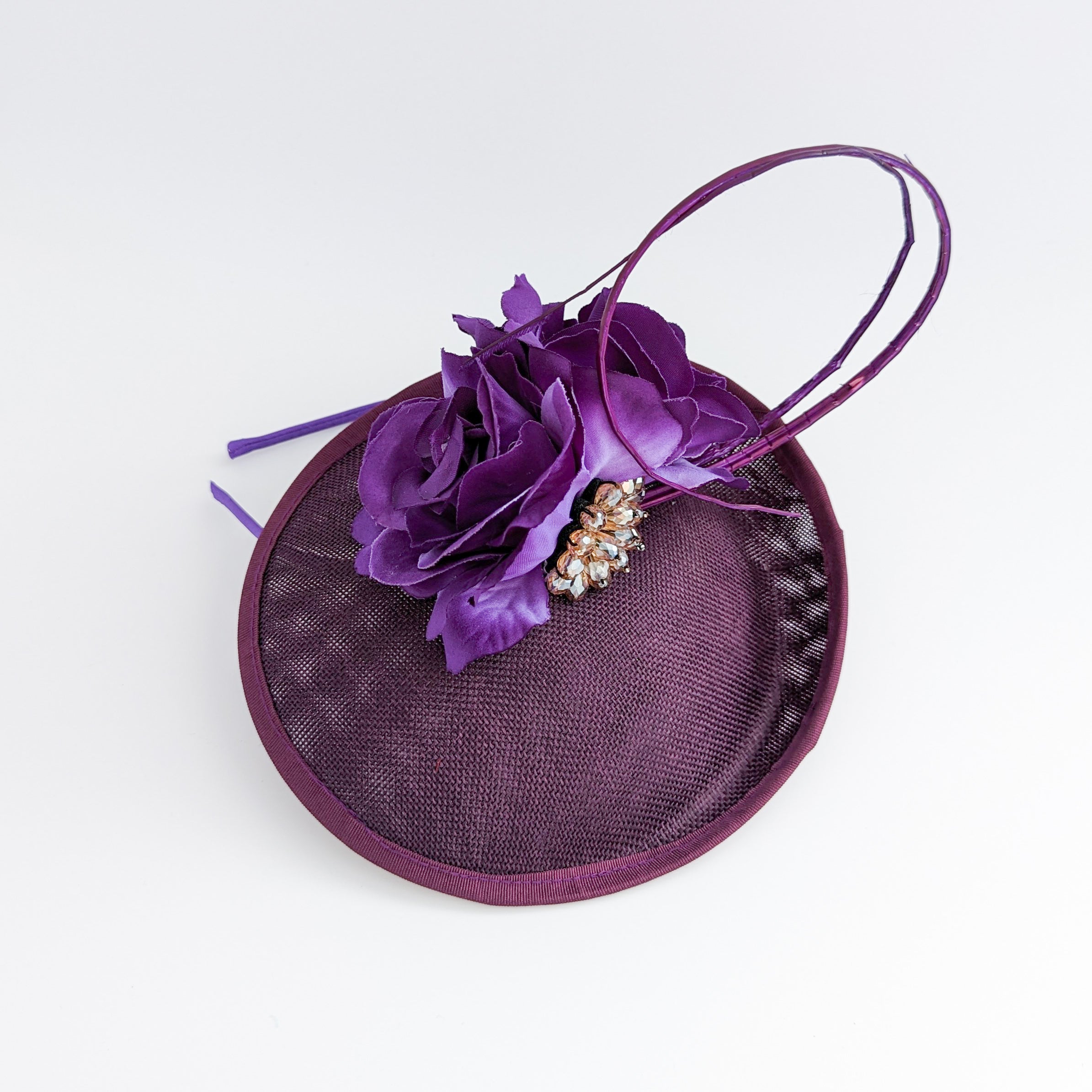 Dark plum purple flower disc saucer fascinator hat