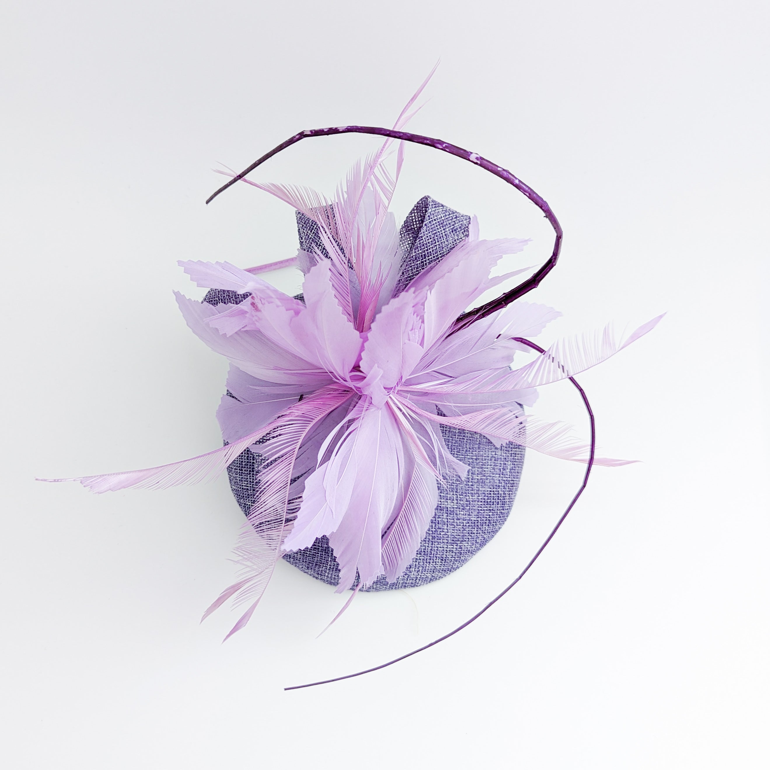 Lavender and lilac purple feather fascinator hat