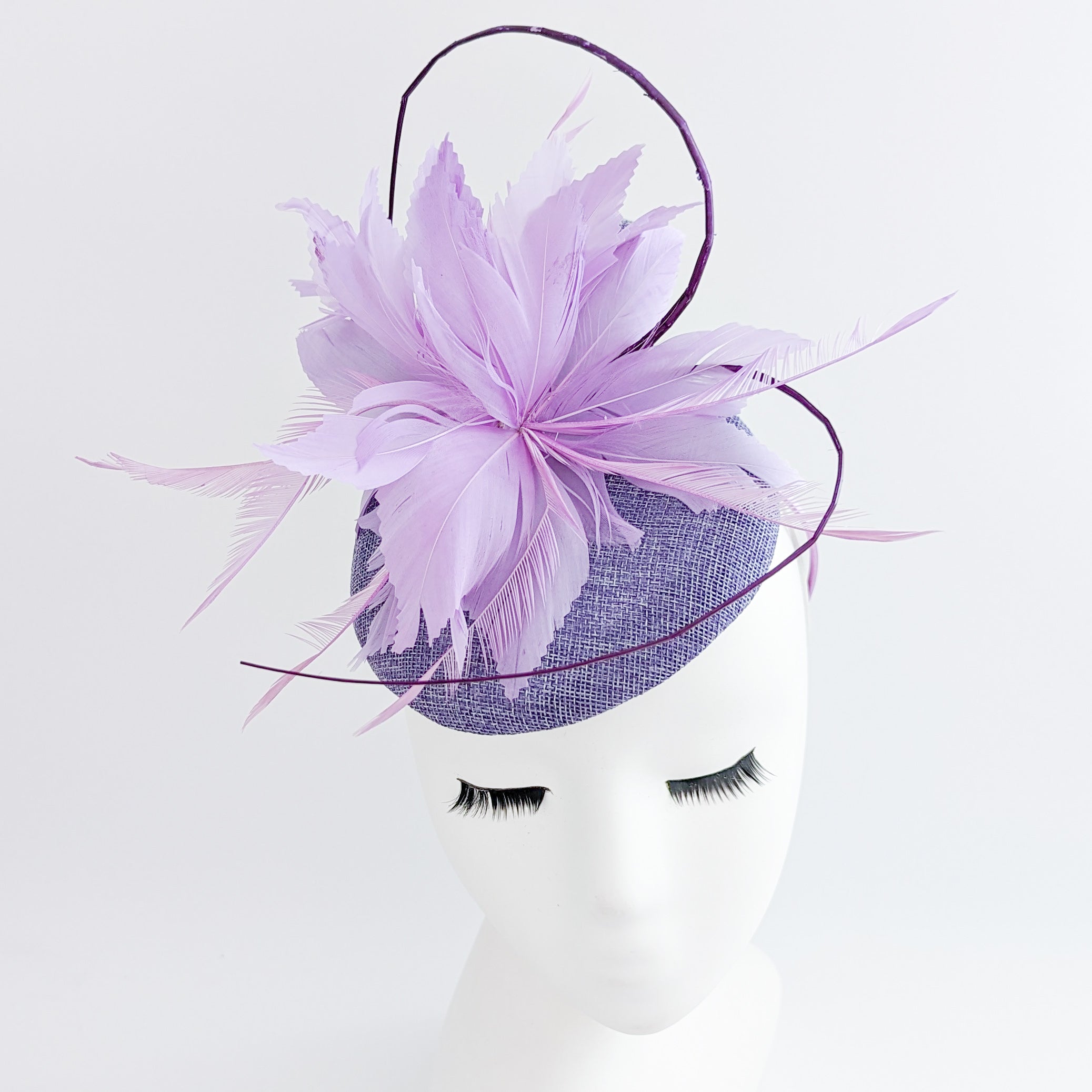 Lavender and lilac purple feather fascinator hat