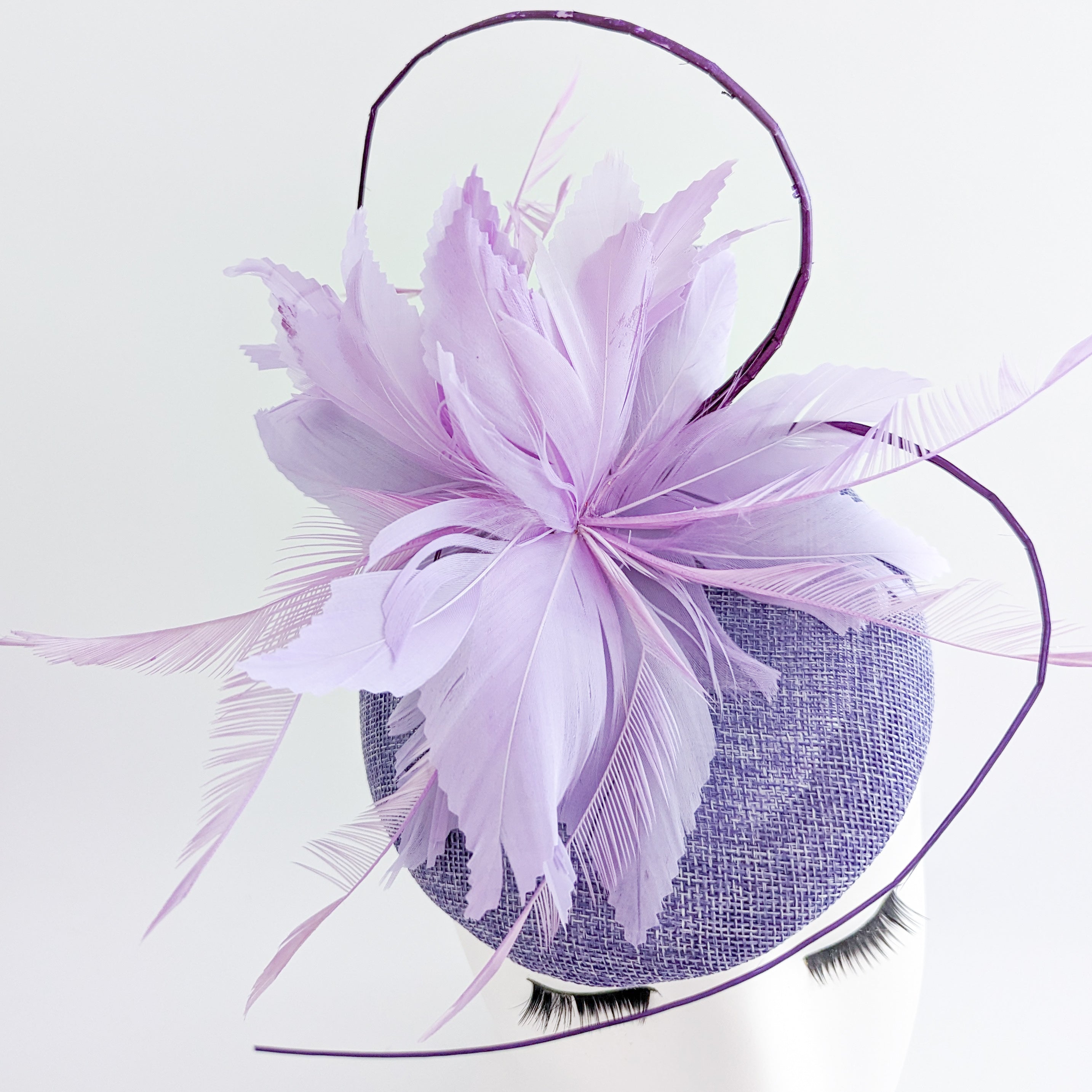 Lavender and lilac purple feather fascinator hat