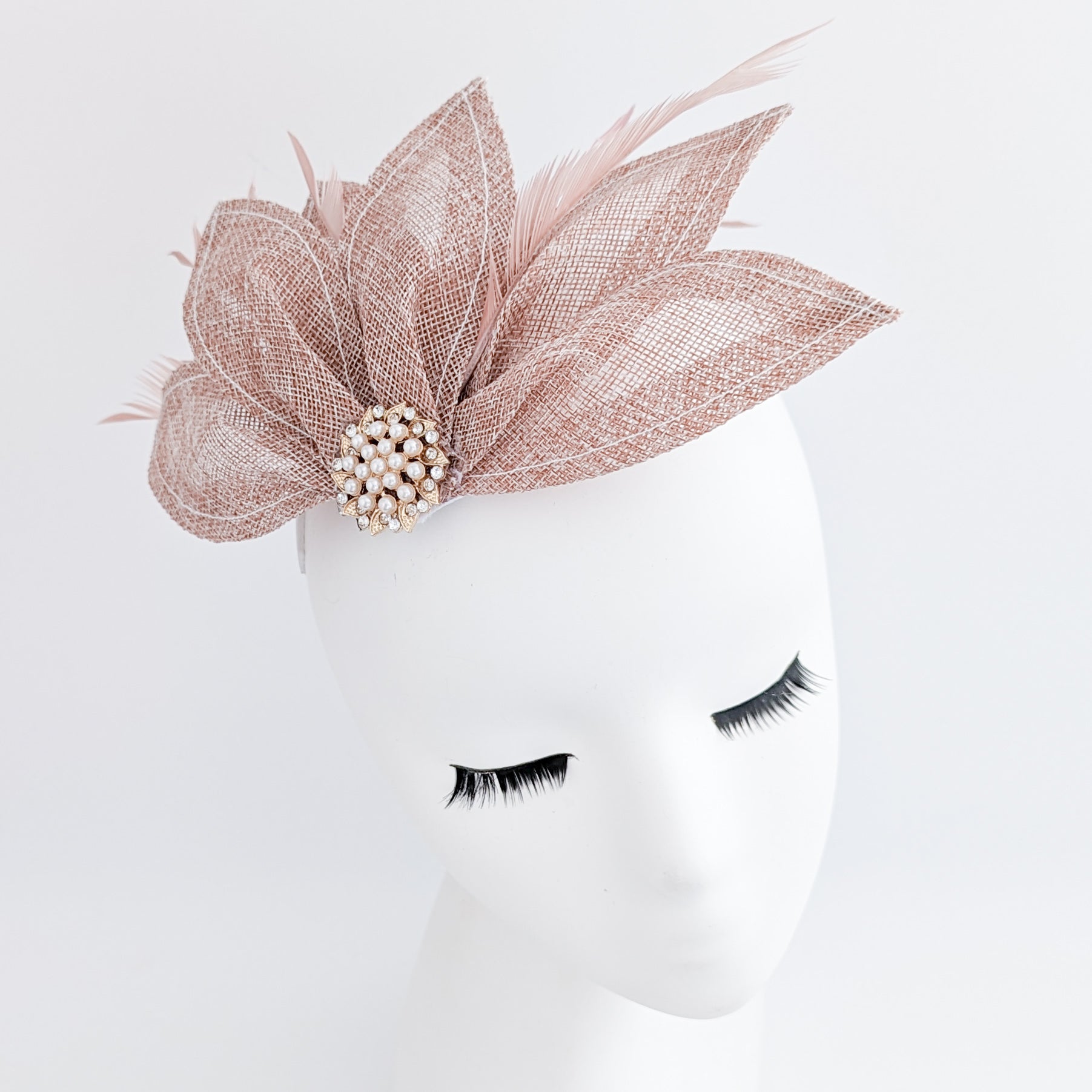 Blush pink feather petal fan fascinator hat