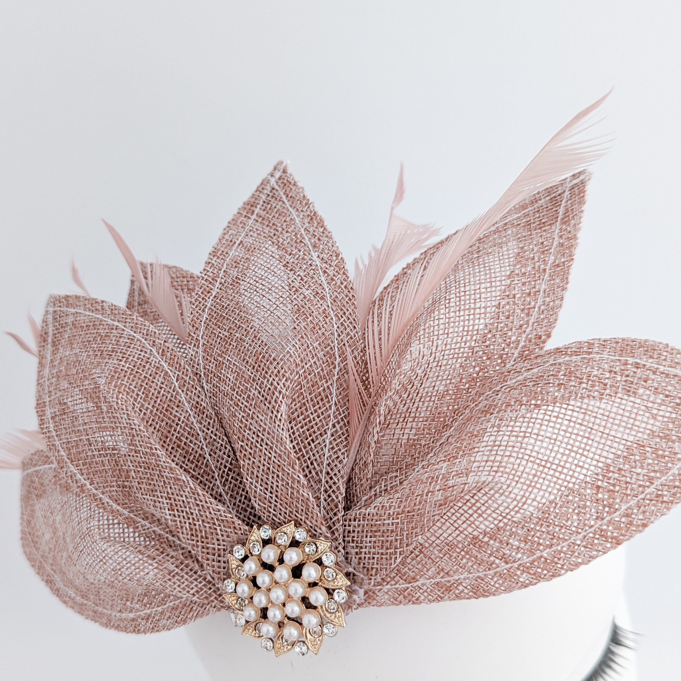 Blush pink feather petal fan fascinator hat