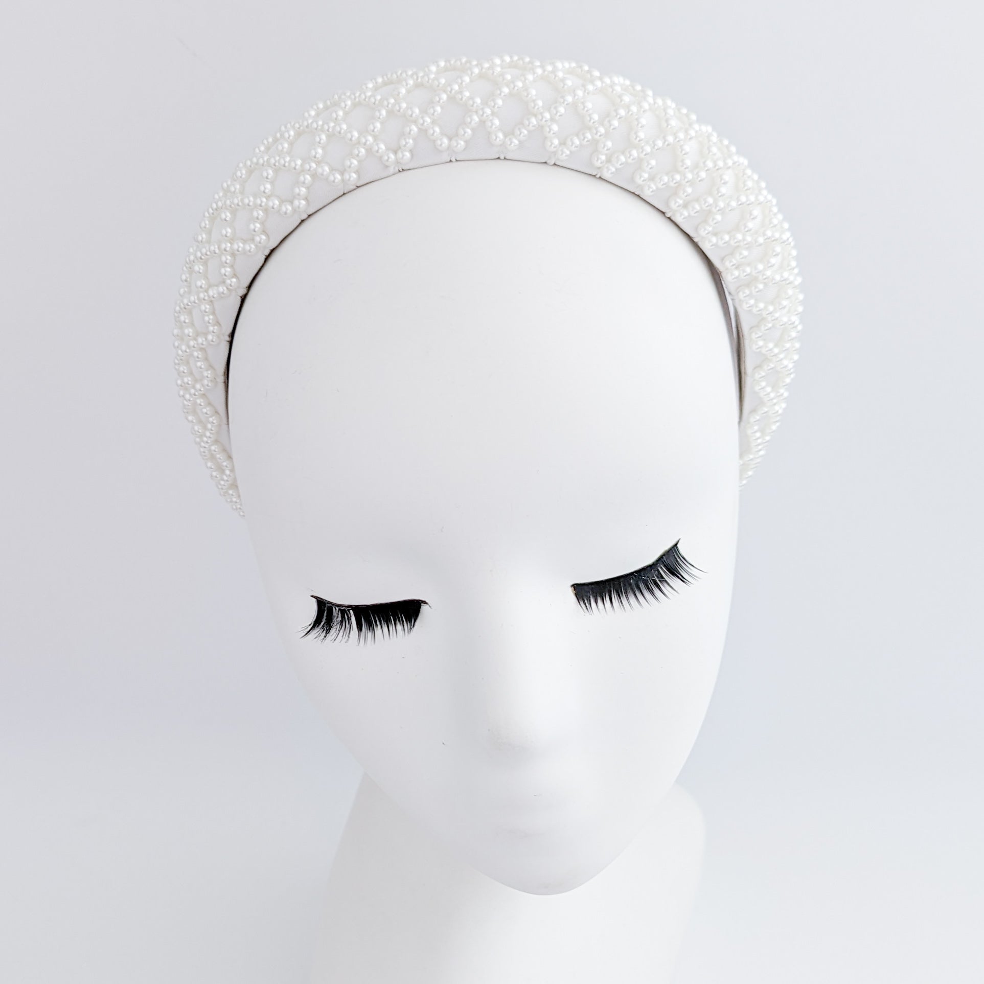 White beaded pearl padded headband fascinator