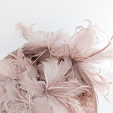 Blush pink large feather saucer disc fascinator hat