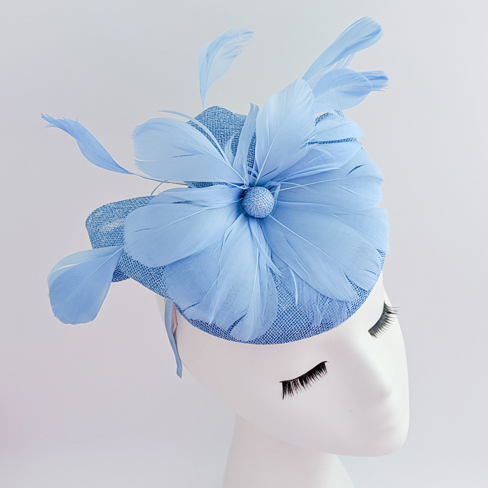 Light cornflower blue feather fascinator hat