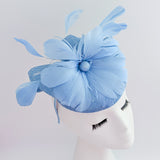 Light cornflower blue feather fascinator hat