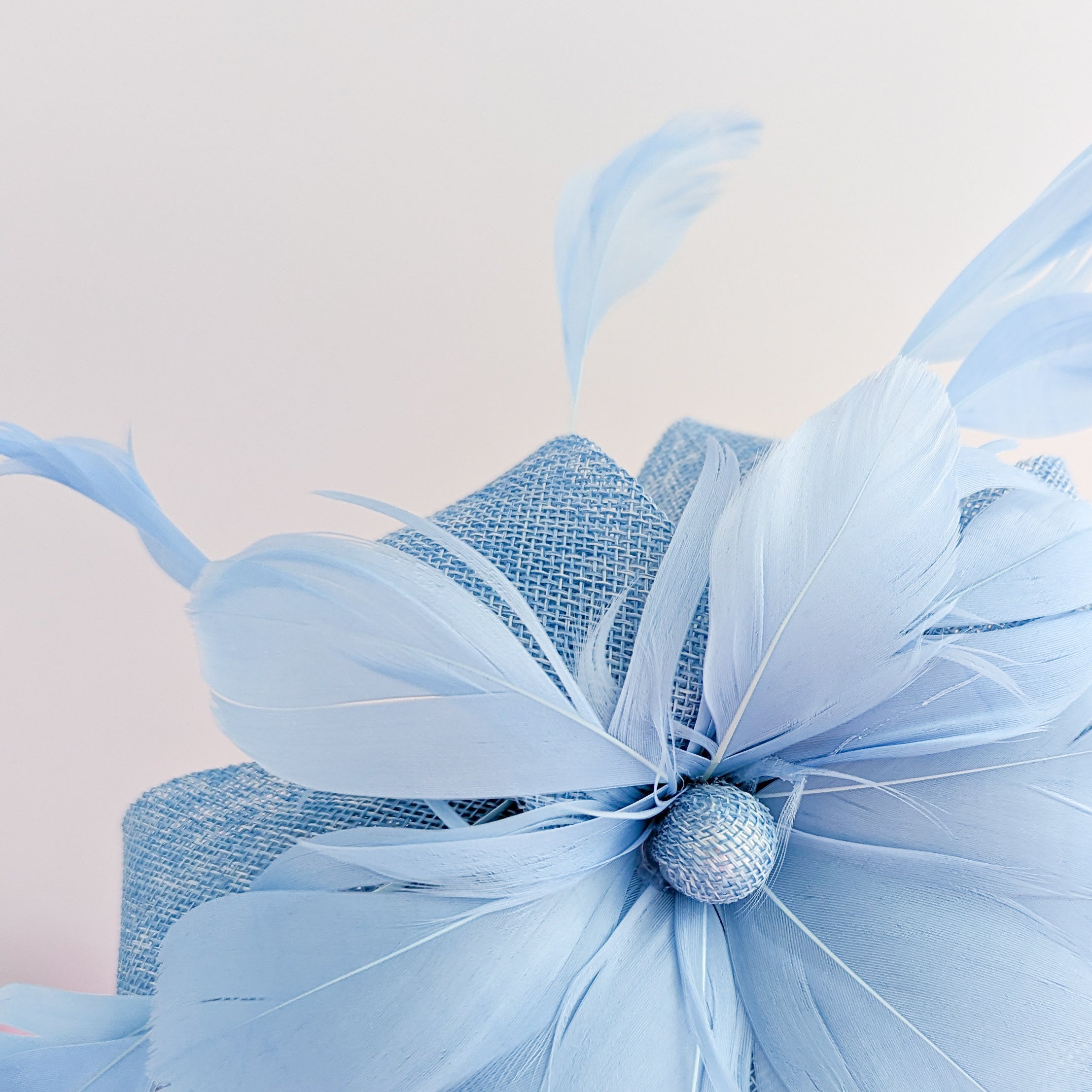 Light cornflower blue feather fascinator hat