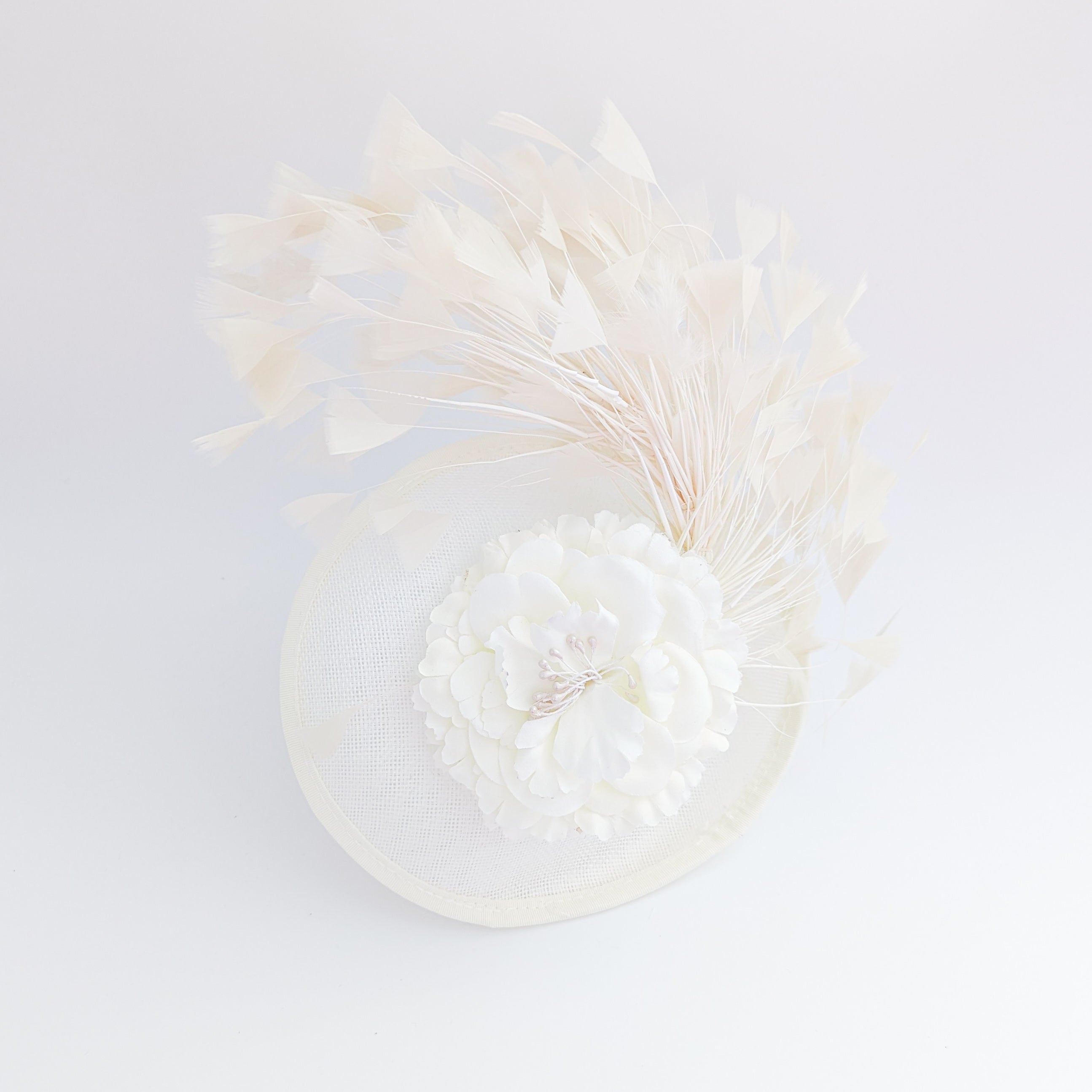 Cream flower feather disc saucer fascinator hat