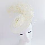 Cream flower feather disc saucer fascinator hat