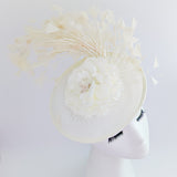 Cream flower feather disc saucer fascinator hat