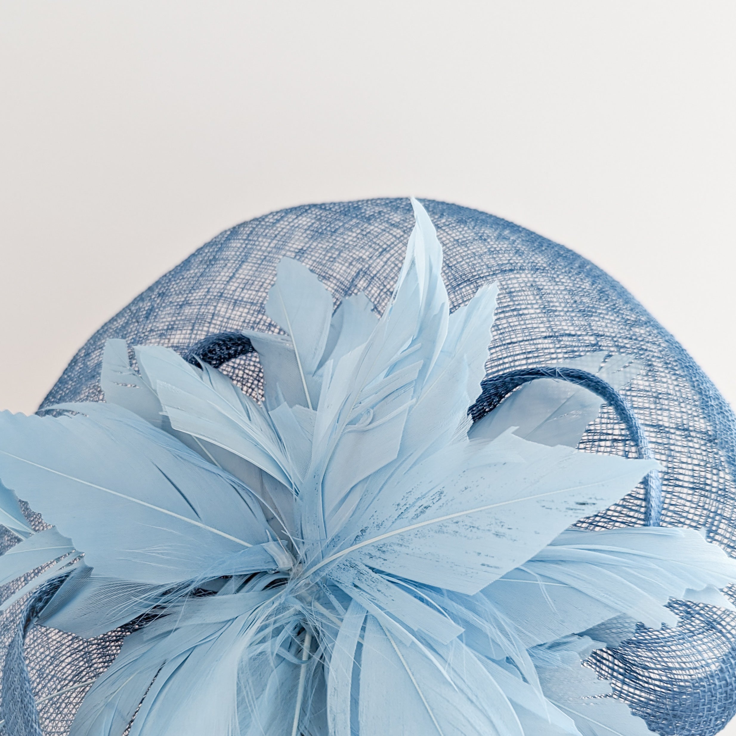 Cornflower blue feather fascinator hat