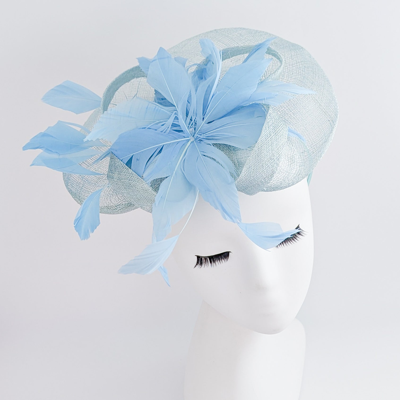 Aquamarine cornflower blue feather fascinator hat