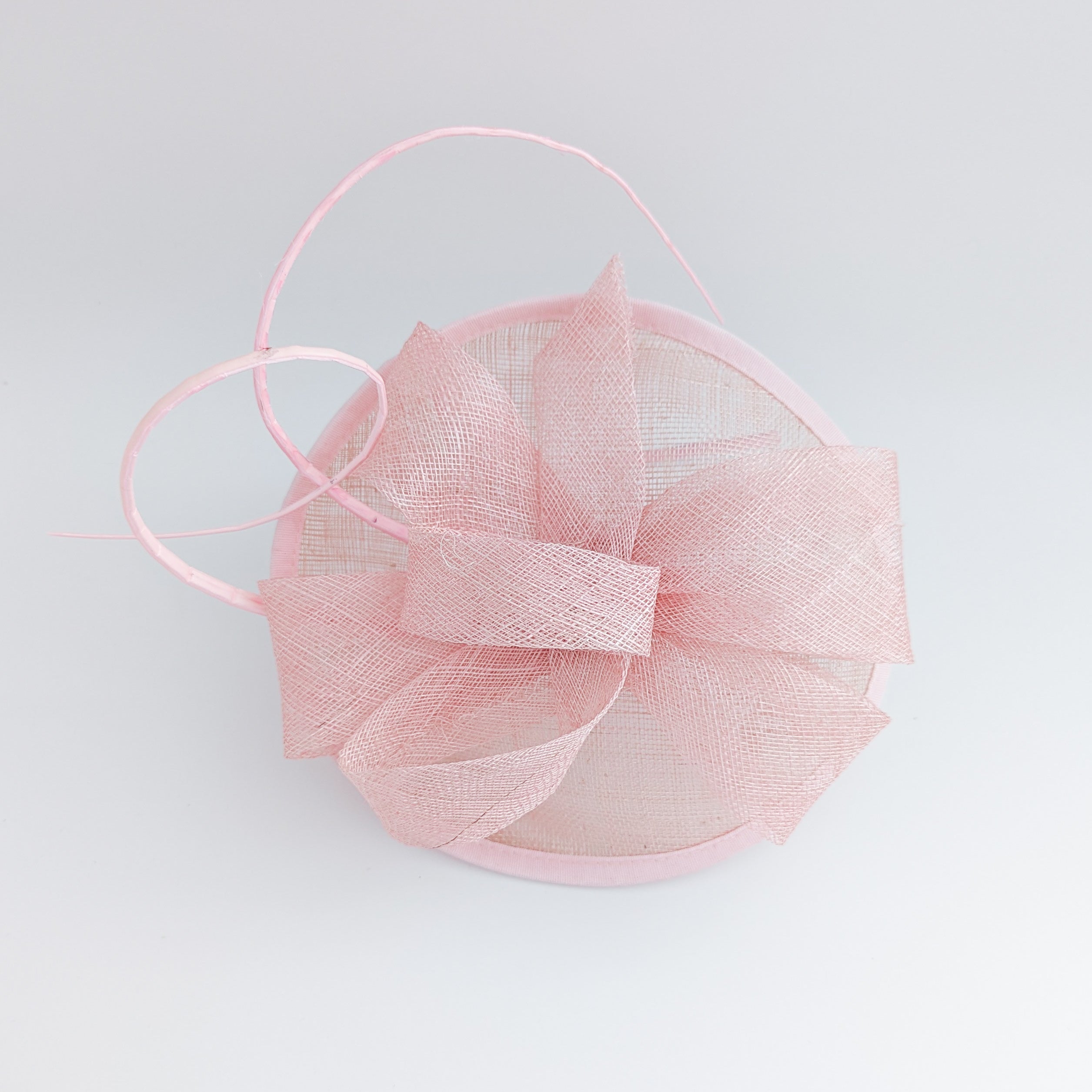 Light pink disc saucer fascinator hat