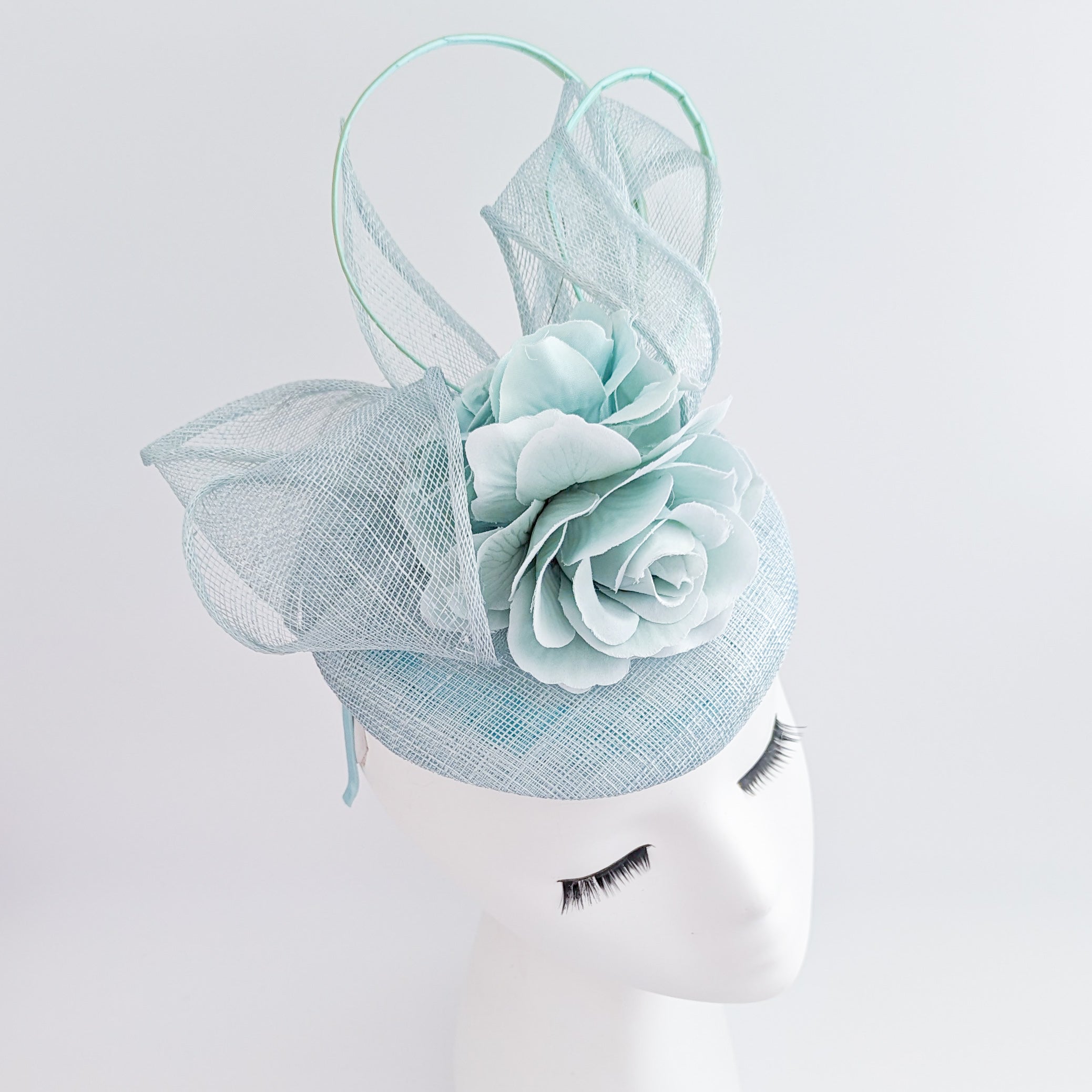 Aquamarine blue flower fascinator hat