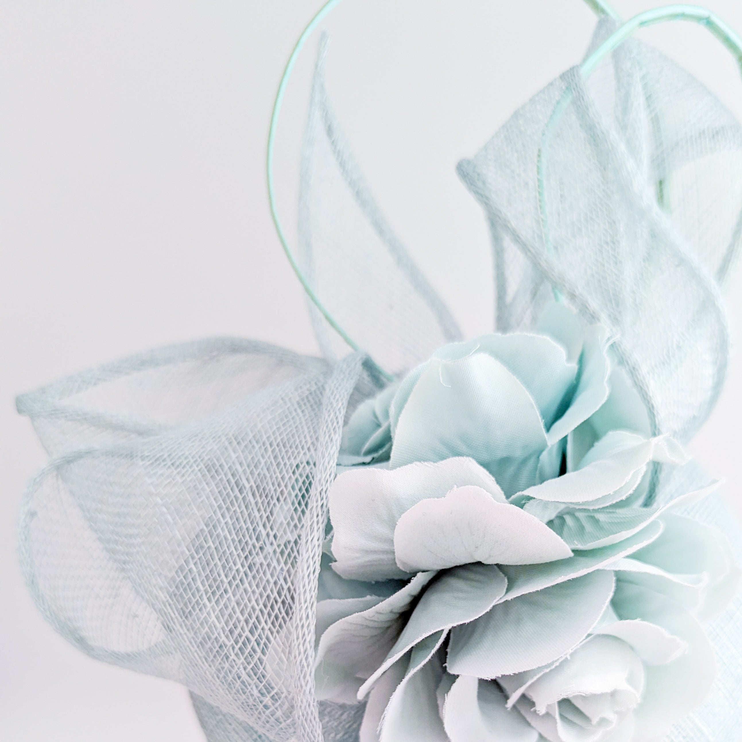 Aquamarine blue flower fascinator hat