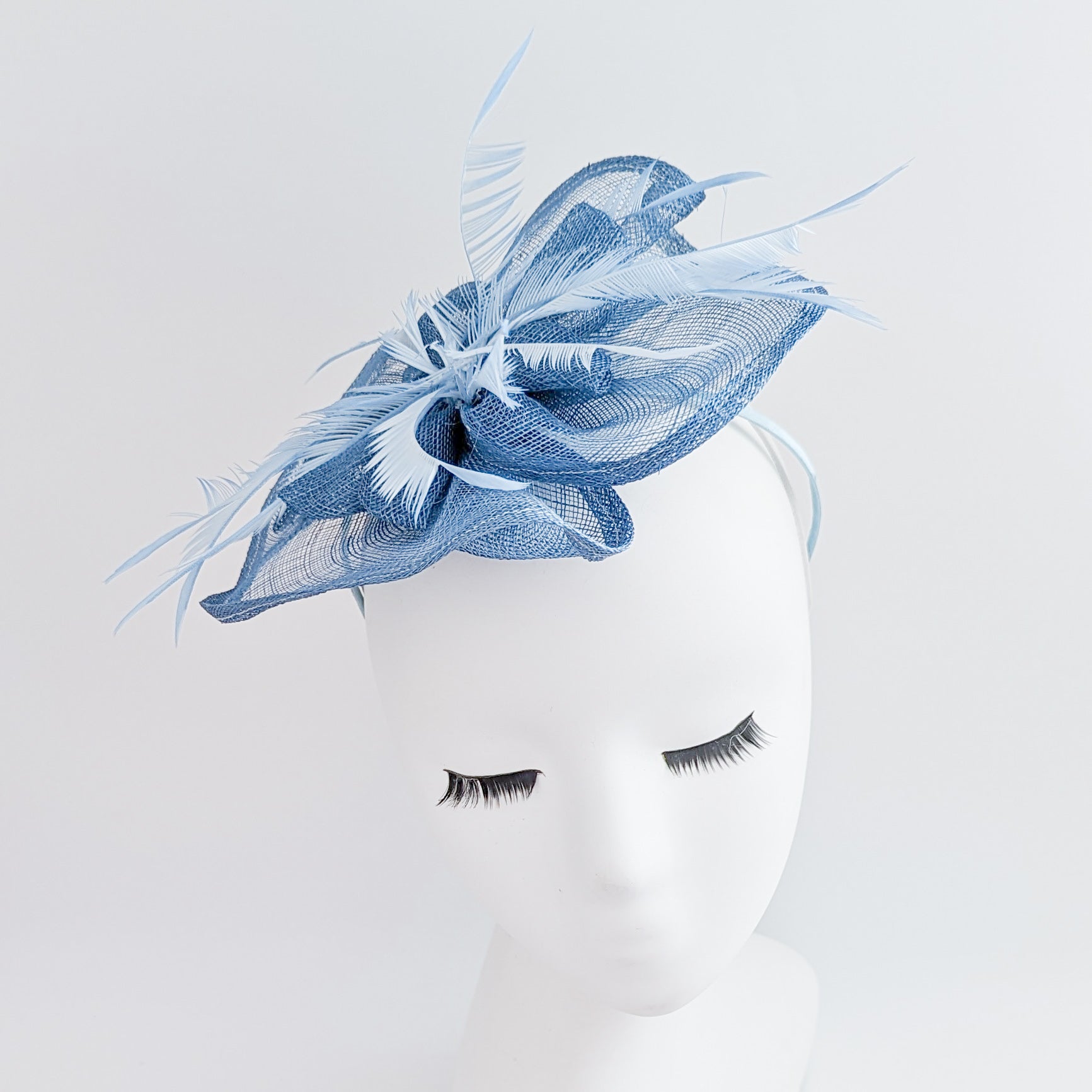 Cornflower blue feather fascinator hat