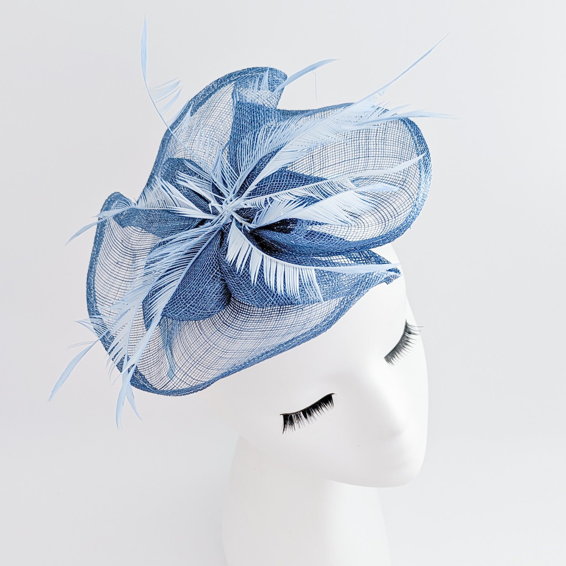 Cornflower blue feather fascinator hat