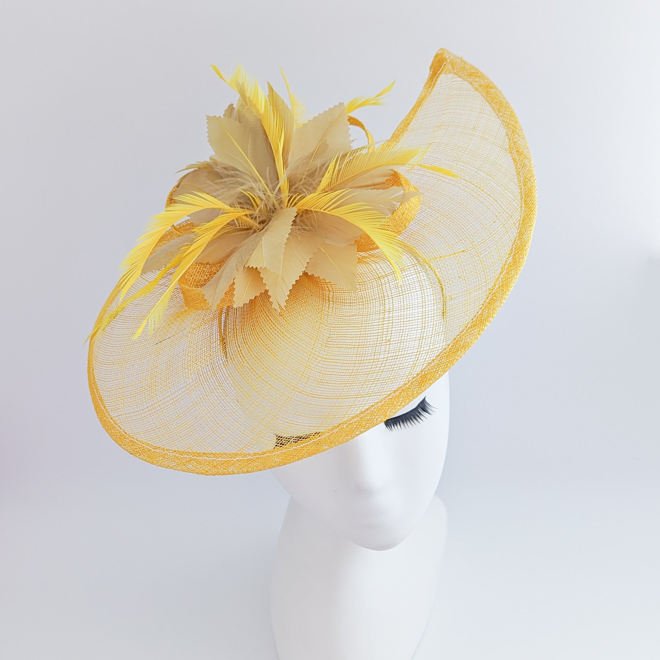 Golden yellow feather large teardrop fascinator hat