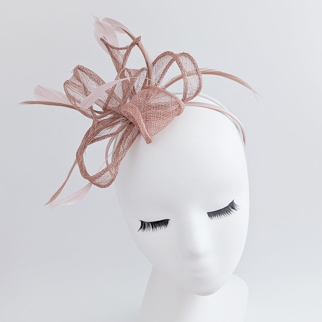 Blush pink feather fascinator hat House of Hats
