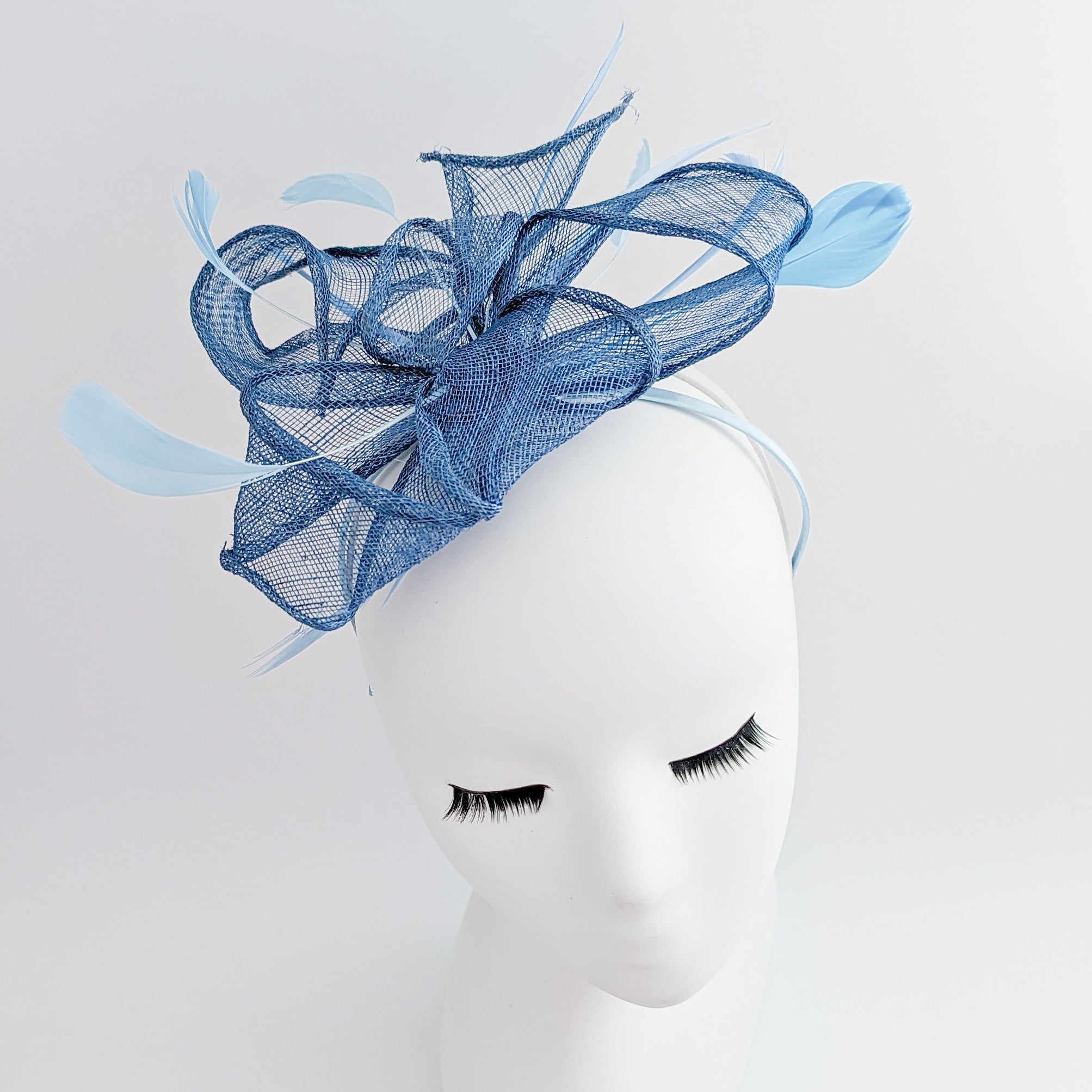 Cornflower blue feather fascinator hat