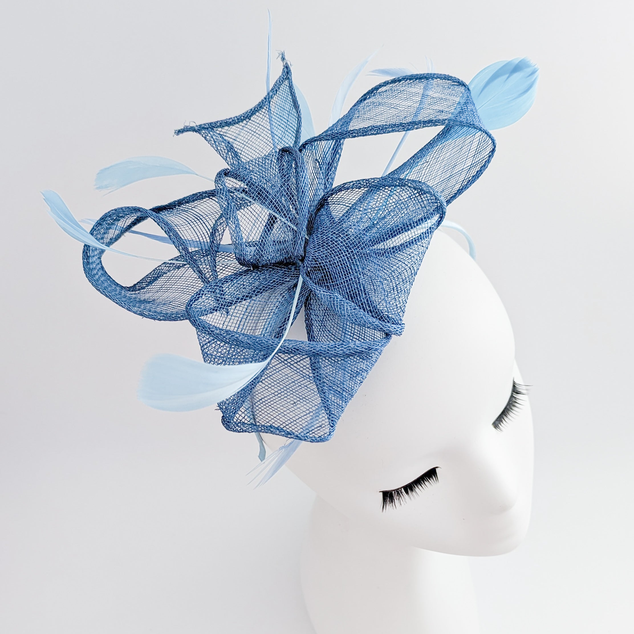 Cornflower blue feather fascinator hat